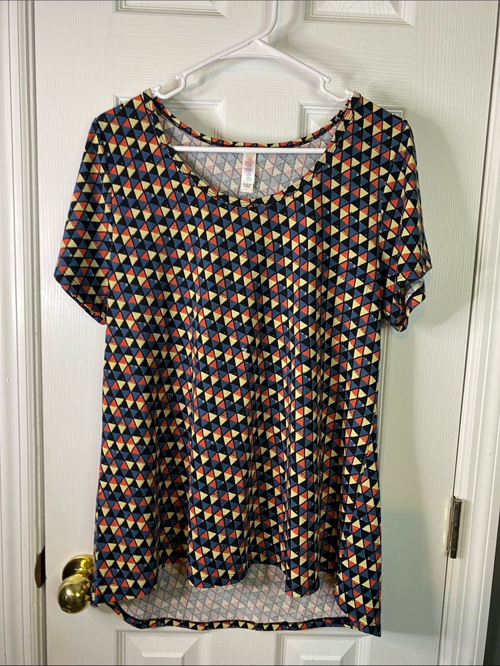 LuLaRoe Navy Geometric Short Sleeve Tunic with Yellow & Coral Accents SizeLarge.